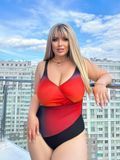 Чорний суцільний купальник PLUS SIZE з помаранчевим градієнтом SW1486 фото